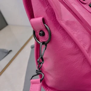 Balenciaga Classic City Small 550646 pink leather handbag with black metal hardware and detachable strap