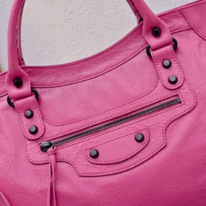 Balenciaga City Bag Medium Style 550646 fuchsia pink crinkled leather handbag with zipper pocket and black hardware