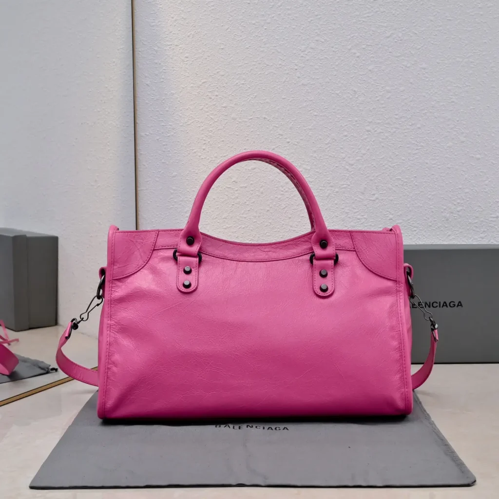 Balenciaga Ville XXS 579372 pink leather handbag with top handles and detachable strap