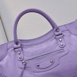 Balenciaga Classic City medium purple distressed leather handbag with silver hardware and front zipper pocket
