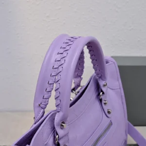 Balenciaga Classic City Medium Style 190387 lilac grained leather handbag with braided handles and silver hardware