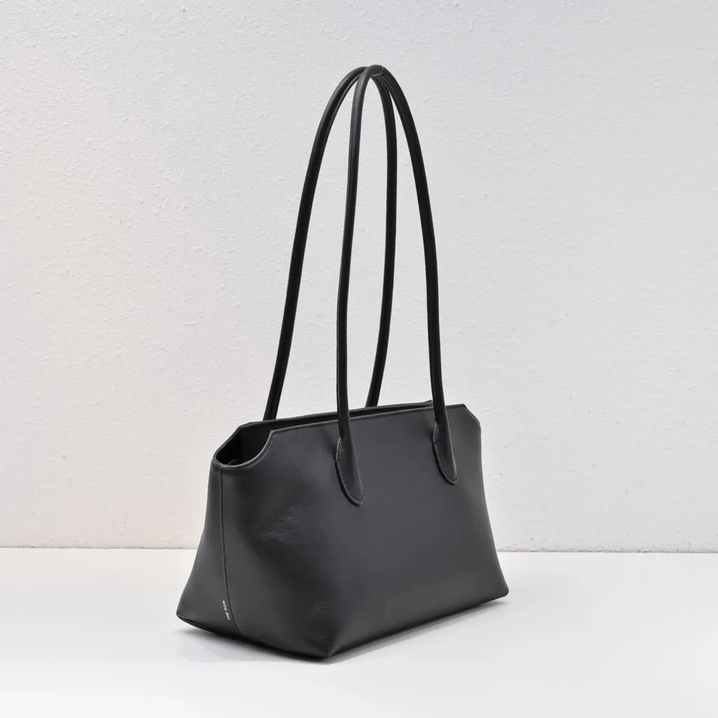 The Row Ascot small tote bag black calfskin leather with long handles