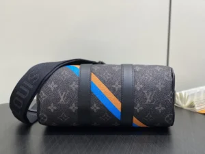 Louis Vuitton Keepall 50 M45558 black monogram canvas bag with blue and orange stripes and leather straps