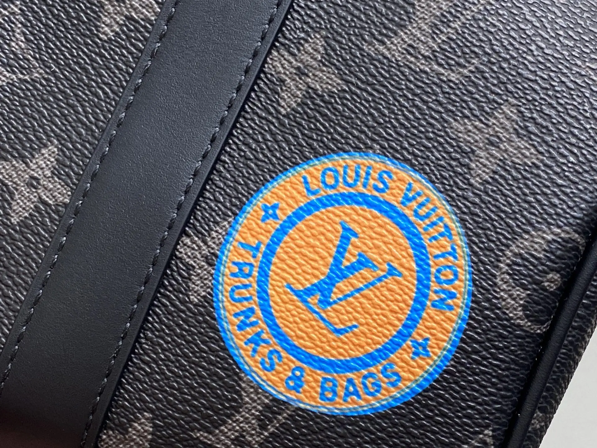 Louis Vuitton trunk and bag monogram canvas logo patch with black leather strap detail