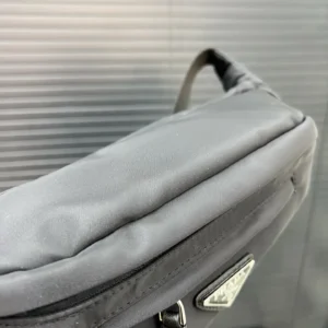 Prada nylon cloth waist bag showcasing sleek design and logo detail, emphasizing high-quality replica features for e-commerce product listing.
