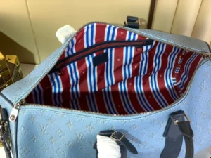 Louis Vuitton Keepall 50 M45780 light blue monogram denim duffle bag with striped fabric lining