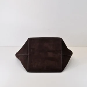 Given the image shows a dark brown leather bag viewed from its base, additional details like brand, model, size, and style ID are required to generate the SEO-optimized alt text as per your rules. Could you please provide those details?