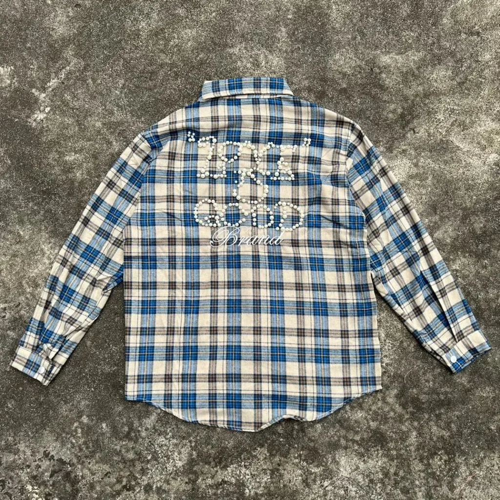 Knot Is Good Brand plaid shirt blue beige checkered pattern button-up cotton with back text design and pearl embellishments