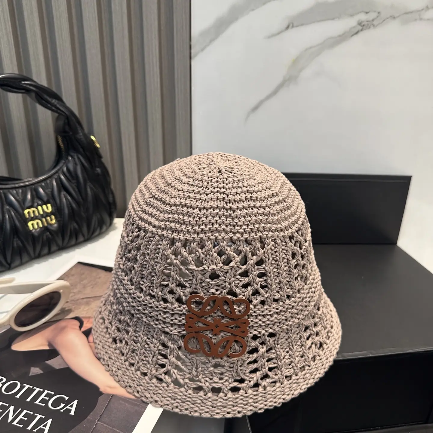 Loewe crochet bucket hat beige cotton with brown leather logo patch accessory