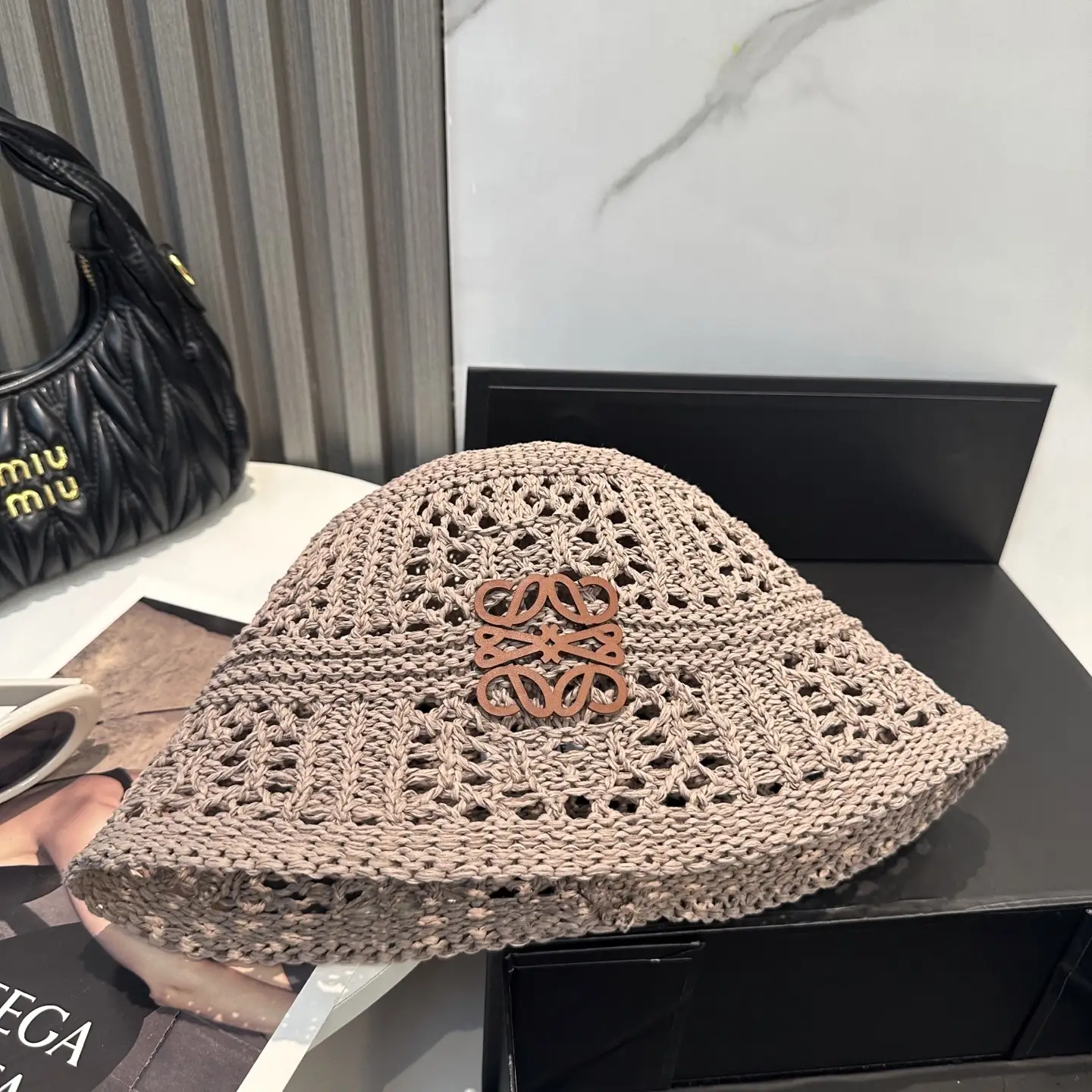 Loewe bucket hat beige woven cotton with leather logo patch accessory