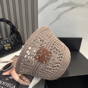 Loewe Paula's Ibiza crochet bucket bag beige cotton with leather logo applique