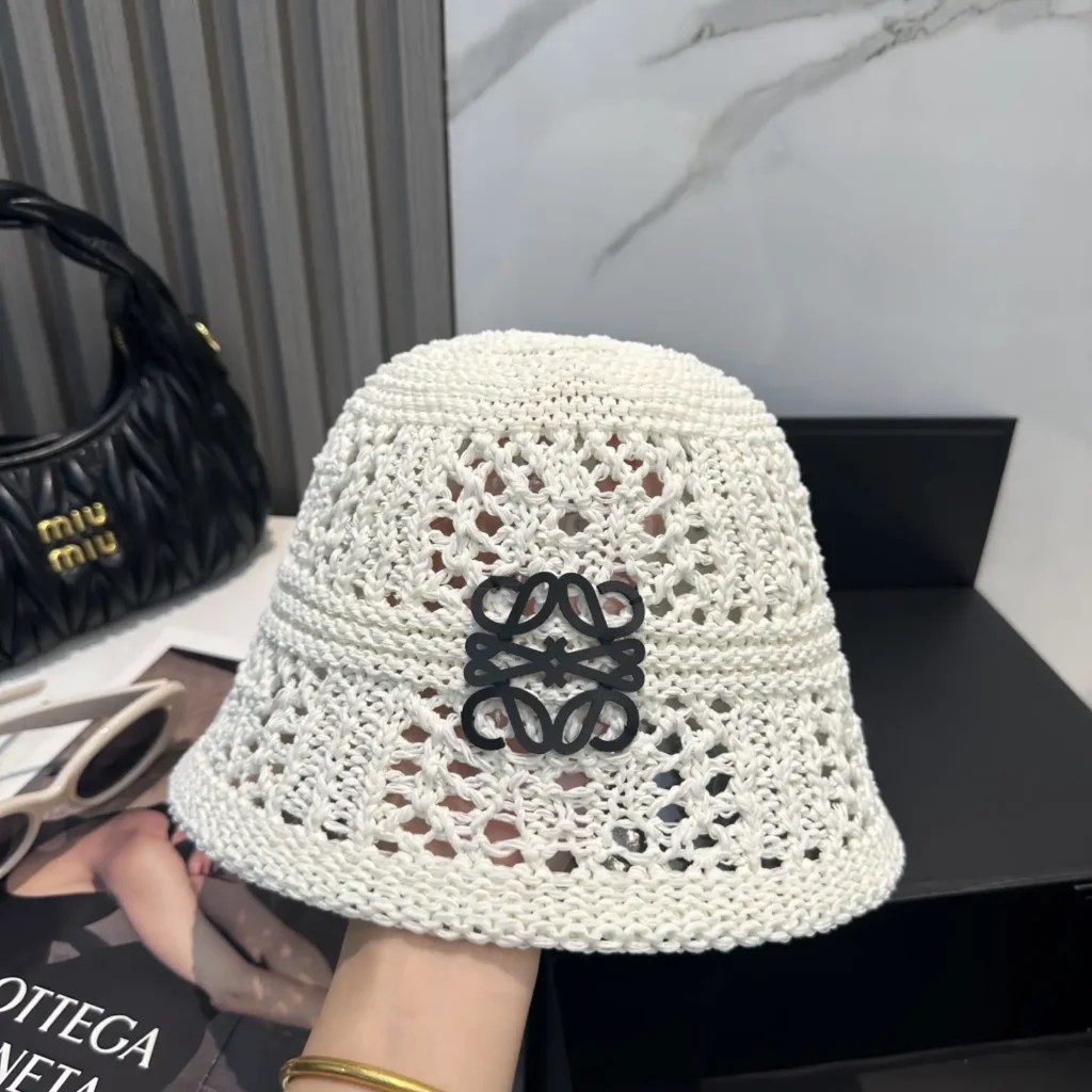 Loewe bucket hat white woven cotton with black intricate logo centerpiece accessory