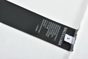 Balenciaga clothing tag size 1 made in Portugal with black and white fabric label