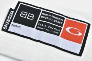 Balenciaga Jersey Fabric Clothing Label Made in Portugal with Paris France Text and Logo Patch
