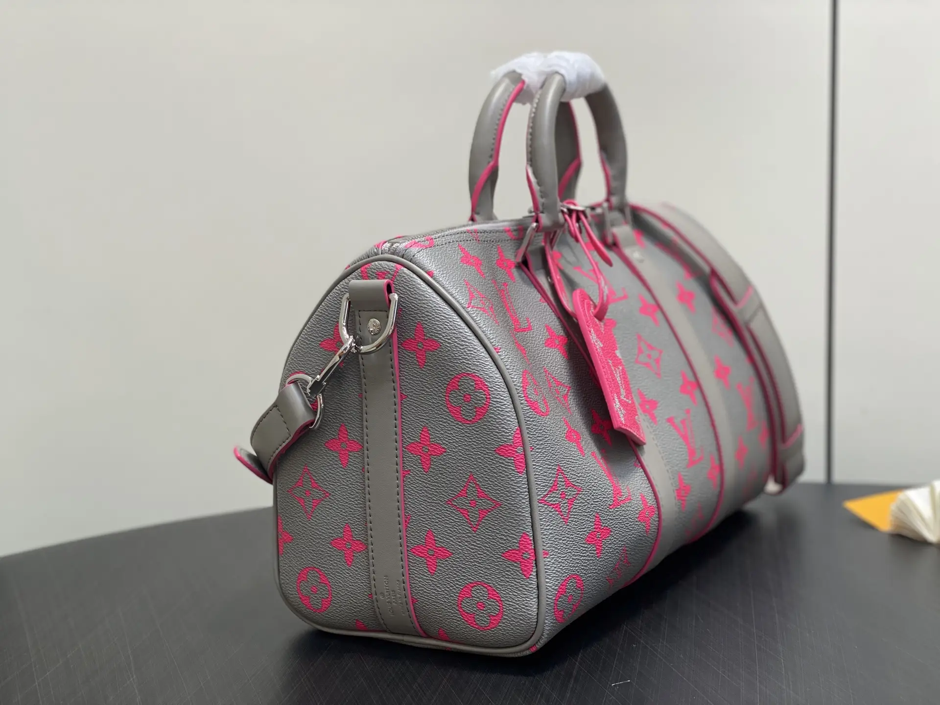 Louis Vuitton Keepall 45 M56782 grey canvas duffle bag with pink monogram leather accents