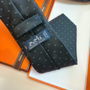 Hermès Paris silk tie navy blue pattern luxury accessory made in France