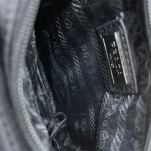 Interior view of Prada Nylon Waist Bag showing branded lining and tag details.