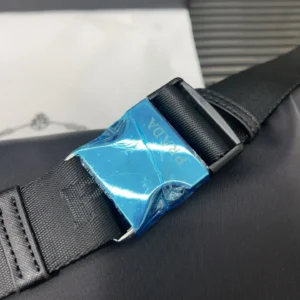 Prada belt black nylon strap silver buckle with blue protective film luxury accessory