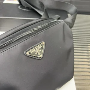 Prada crossbody bag black nylon compact size with silver zipper and leather strap