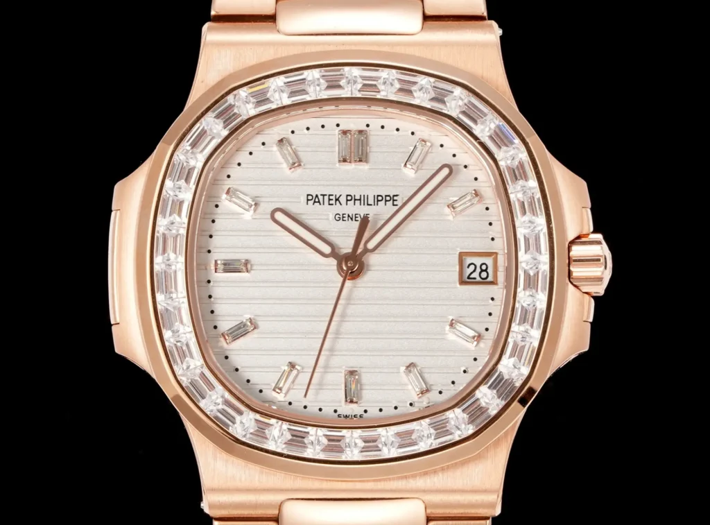 Patek Philippe Nautilus white dial diamond bezel rose gold case watch with date window