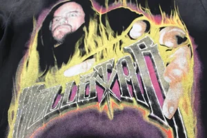 No brand name visible on graphic hoodie with a flame design and person pointing hand illustration in yellow and purple colors