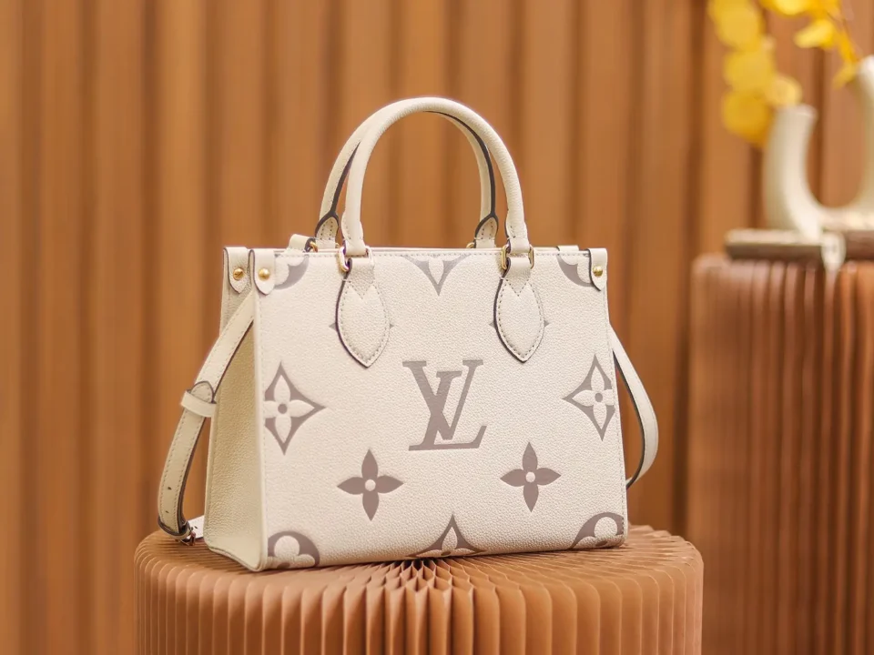 Louis Vuitton OnTheGo MM tote bag white taupe monogram canvas leather handles