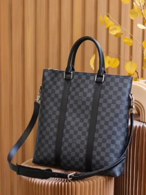Montaigne BB Monogram canvas handbag with a checkered pattern, featuring dual handles and a detachable shoulder strap, set against a textured wooden background.