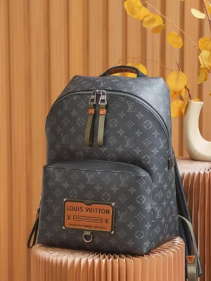 Louis Vuitton Backpack PM M56714 monogram canvas black and brown leather trim bag with front pocket