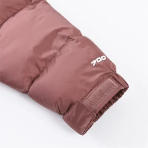 The North Face 700 insulated puffer jacket mauve color nylon material with adjustable cuff detail