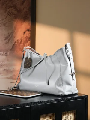 Louis Vuitton Leather Shoulder Bag grey leather with monogram canvas pouch and adjustable strap