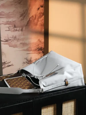 Louis Vuitton NéoNoé PM medium white leather bucket bag with monogram canvas strap and pouch