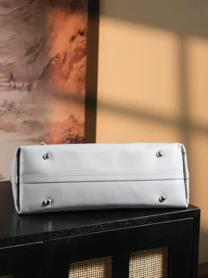 Prada tote bag medium gray saffiano leather with metal feet base detail