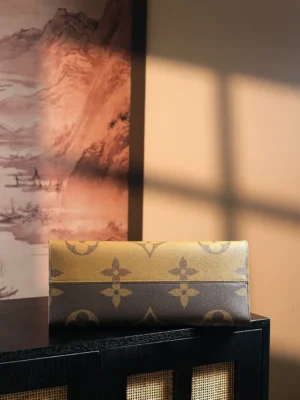 Louis Vuitton Sarah wallet medium brown monogram canvas leather trim luxury accessory