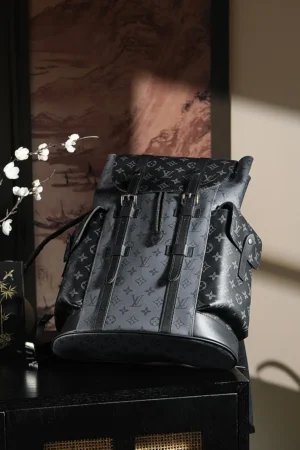 Louis Vuitton Chip Diamond Jumping Code Backpack in black, featuring iconic monogram pattern, adjustable straps, and stylish design, displayed on a sleek surface.