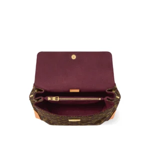 Interior view of a Louis Vuitton Myers Bracket shoulder bag, featuring a burgundy lining, a gold clasp, and a small pocket with a strap, showcasing the replica luxury item available for 9.00.