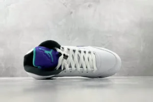 Nike Air Jordan 5 Retro white purple teal black leather sneakers with lace lock and padded tongue