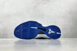 Nike Zoom Kobe 6 Protro “Dodge” sneaker sole with blue traction pattern and Kobe logo, showcasing premium design and craftsmanship.