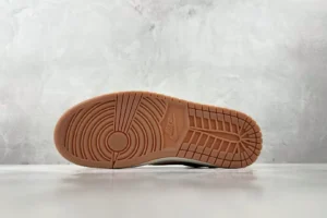 Nike Air Jordan 1 Low OG beige gum rubber sole leather sneakers viewed from bottom outsole