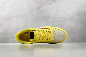 Nike Air Jordan 1 Low yellow red white leather sneakers with perforated toe box and padded collar