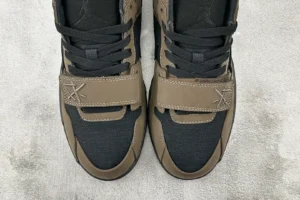 Nike Air Jordan 1 High OG Travis Scott black and brown leather sneakers with hook strap closure