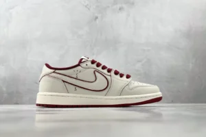 Nike Air Jordan 1 Low OG Sail Team Red leather sneakers with maroon accents and white sole