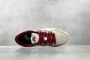 Nike Air Jordan 1 Low "Uniform Red" white and red leather sneakers with perforated toe box