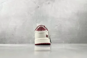 Nike Air Jordan 1 Low dark maroon white leather sneakers with embroidered logo and red outsole
