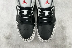 Nike Air Jordan 1 Low black white cement print leather sneakers with red Jumpman logo on tongue