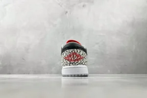Air Jordan 1 Low SE black white red elephant print leather sneakers rear view