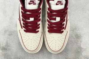 Nike Air Jordan 1 Low OG white burgundy leather sneakers with perforated toe box and matching laces