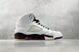 Nike Air Jordan 5 Retro white burgundy black leather sneakers with icy sole detailing