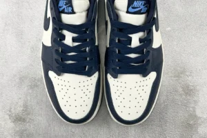 Nike Air Jordan 1 Low OG Navy white black leather sneakers with blue laces and Nike Air tongue tag