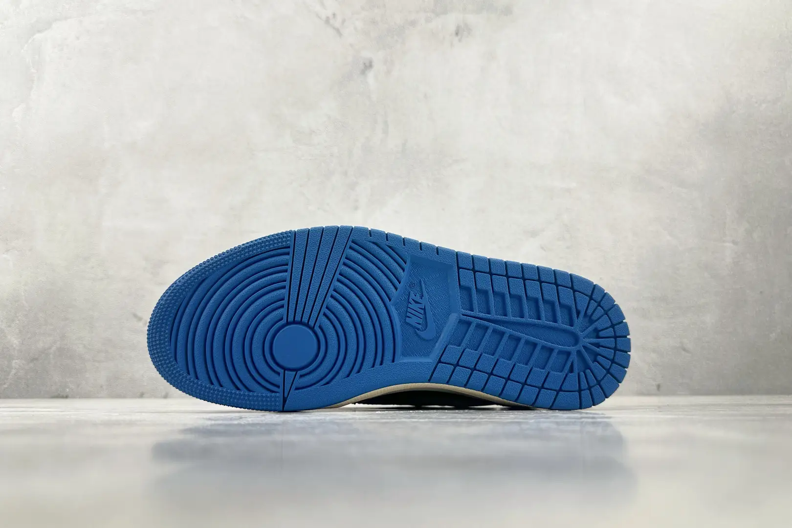 Nike Jordan 1 Low OG Blue Sole Style DH6932-145 white black leather sneaker outsole view