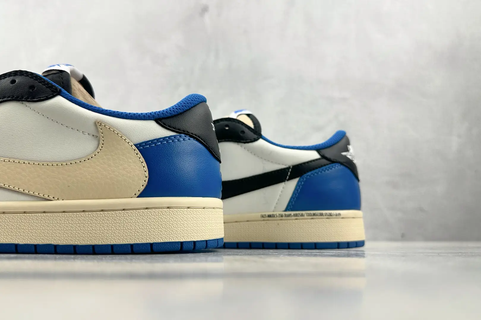 Nike Jordan 1 Low OG Travis Scott Style DA2728-146 white black blue leather sneakers with reverse swoosh design